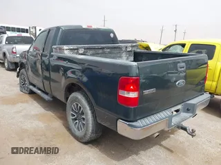 2005 Ford F-150 XL with VIN 1FTRF14555KB88186, listed as a IAAI auction lot 41815601 with 195,049 mi miles. Bid and sale history available at carsss.com. Image 3.