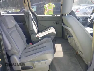 2005 Dodge Caravan SXT z VIN 2D4GP44LX5R581304, wystawiony jako IAAI lot #42709024 z przebiegiem 79 073 mil mil oraz . Historia ofert i sprzedaży dostępna na DreamBid. Obrazek 8.