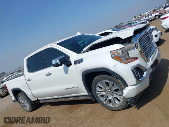 2021 GMC Sierra 1500 Denali z VIN 3GTU9FEL1MG349215, wystawiony jako IAAI lot #42585810 z przebiegiem 97 465 mil mil oraz . Historia ofert i sprzedaży dostępna na DreamBid. Obrazek 13.