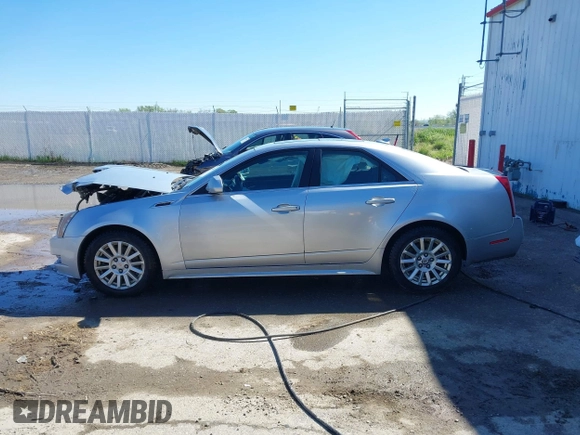 2012 Cadillac CTS with VIN 1G6DC5E55C0133032, listed as a IAAI auction lot 42189802 with 196,482 mi miles and . Bid and sale history available at DreamBid. Image 14.