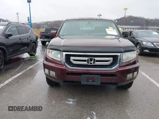2009 Honda Ridgeline RTL with VIN 5FPYK16529B100032, listed as a IAAI auction lot 41206781 with 130,694 mi miles and . Bid and sale history available at DreamBid. Image 12.