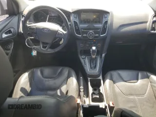 2016 Ford Focus Titanium z VIN 1FADP3J25GL201003, wystawiony jako Copart lot #53799745 z przebiegiem 194 055 mil mil oraz Szkoda całkowita • Salvage title. Historia ofert i sprzedaży dostępna na DreamBid. Obrazek 8.