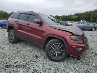 2019 Jeep Grand Cherokee Trailhawk with VIN 1C4RJFLT9KC718628, listed as a Copart auction lot 72646234 with 94,980 mi miles and Salvage title. Bid and sale history available at DreamBid. Image 4.