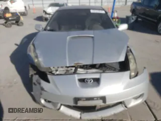 2002 Toyota Celica GT with VIN JTDDR32T220128940, listed as a Copart auction lot 73731814 with 0 mi miles and Salvage Title. Bid and sale history available at carsss.com. Image 5.