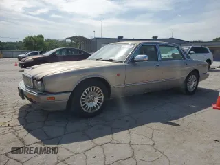1996 Jaguar XJ with VIN SAJKX6748TC774730, listed as a Copart auction lot 55211875 with 91,435 mi miles and Clean title. Bid and sale history available at DreamBid. Image 1.