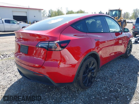 2022 Tesla Model Y Long Range with VIN 7SAYGDEE7NF549278, listed as a IAAI auction lot 42072801 with 39,374 mi miles and . Bid and sale history available at carsss.com. Image 4.