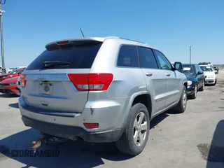 2012 Jeep Grand Cherokee Laredo with VIN 1C4RJEAG5CC112230, listed as a IAAI auction lot 41997483 with 302,923 mi miles. Bid and sale history available at carsss.com. Image 4.
