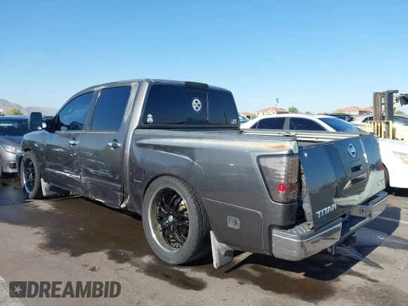 2004 Nissan Titan LE with VIN 1N6AA07A14N541998, listed as a IAAI auction lot 42304039 with 189,533 mi miles and . Bid and sale history available at DreamBid. Image 6.