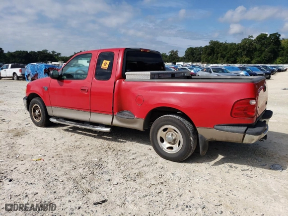 2003 Ford F-150 XL with VIN 1FTRX07WX3KD51374, listed as a Copart auction lot 71796464 with 130,319 mi miles and Salvage Title. Bid and sale history available at carsss.com. Image 2.