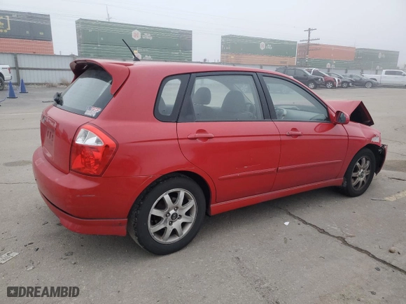 2005 Kia Spectra with VIN KNAFE161555106792, listed as a Copart auction lot 82832374 with 101,747 mi miles and Salvage Title. Bid and sale history available at carsss.com. Image 3.