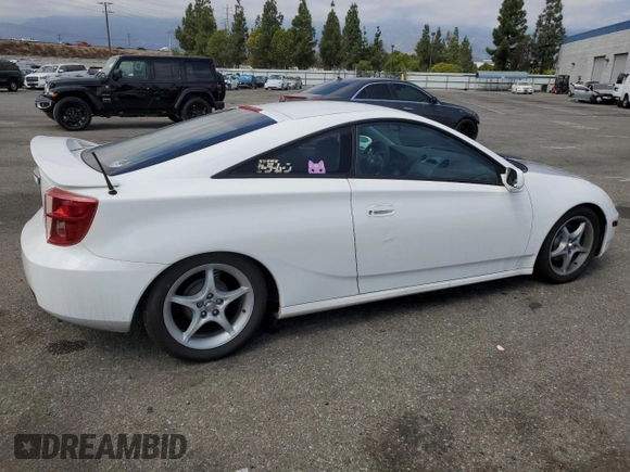 2004 Toyota Celica GT with VIN JTDDR32TX40174017, listed as a Copart auction lot 73748694 with 138,701 mi miles and Salvage Title. Bid and sale history available at DreamBid. Image 3.