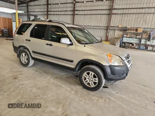 2002 Honda CR-V EX with VIN JHLRD78852C054719, listed as a Copart auction lot 64464625 with 313,662 mi miles and Clean title. Bid and sale history available at DreamBid. Image 4.