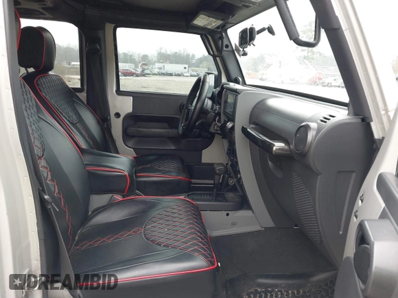 2007 Jeep Wrangler Unlimited X with VIN 1J4GA391X7L107424, listed as a IAAI auction lot 41752013 with 196,557 mi miles and . Bid and sale history available at DreamBid. Image 5.