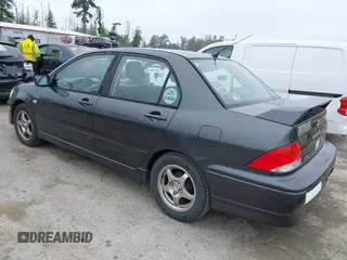 2002 Mitsubishi Lancer OZ-Rally z VIN JA3AJ86EX2U059845, wystawiony jako IAAI lot #42371709 z przebiegiem 207 665 mil mil oraz . Historia ofert i sprzedaży dostępna na DreamBid. Obrazek 3.