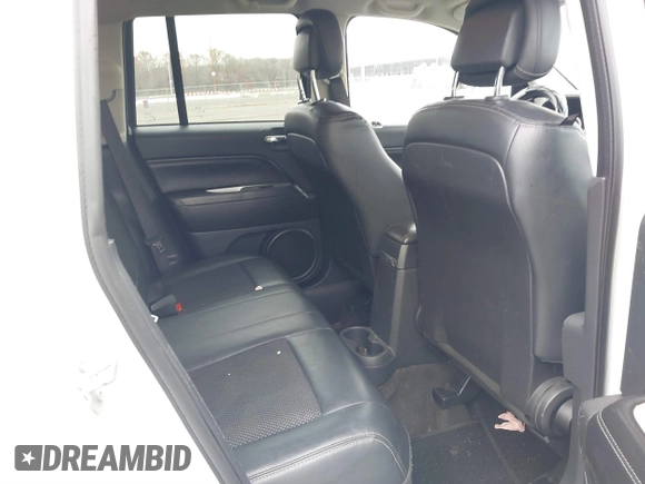 2016 Jeep Compass Latitude with VIN 1C4NJCEA3GD735161, listed as a IAAI auction lot 40881008 with 126,384 mi miles. Bid and sale history available at carsss.com. Image 8.