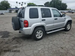 2002 Jeep Liberty Limited with VIN 1J8GK58K52W303098, listed as a Copart auction lot 56005185 with 77,206 mi miles and Clean title. Bid and sale history available at DreamBid. Image 3.