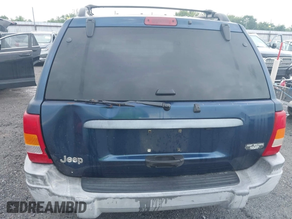 2000 Jeep Grand Cherokee Laredo with VIN 1J4G248S4YC144404, listed as a IAAI auction lot 42114635 with 181,854 mi miles and . Bid and sale history available at DreamBid. Image 12.