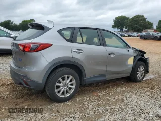 2015 Mazda CX-5 Sport z VIN JM3KE2BE4F0459532, wystawiony jako Copart lot #61049235 z przebiegiem 149 808 mil mil oraz Szkoda całkowita • Salvage title. Historia ofert i sprzedaży dostępna na DreamBid. Obrazek 3.
