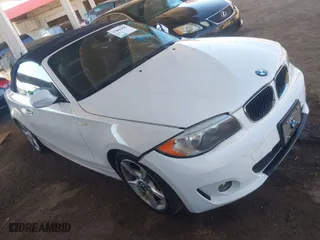 2013 BMW 1 Series 128i with VIN WBAUN1C55DVR01404, listed as a IAAI auction lot 41682695 with 100,948 mi miles. Bid and sale history available at carsss.com. Image 1.