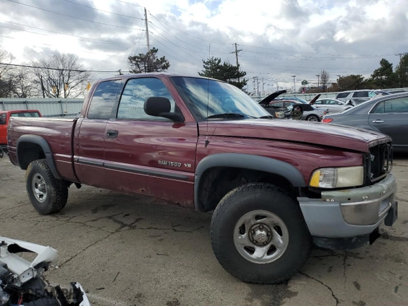 2000 Dodge Ram 1500 with VIN 1B7HC13Y9YJ157209, listed as a Copart auction lot 47198055 with 142,848 mi miles and Salvage Title. Bid and sale history available at carsss.com. Image 4.