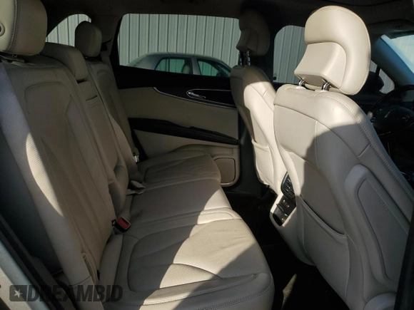 2016 Lincoln MKX Reserve z VIN 2LMPJ6LR7GBL74185, wystawiony jako Copart lot #87799275 z przebiegiem 89 977 mil mil oraz Szkoda całkowita • Salvage title. Historia ofert i sprzedaży dostępna na DreamBid. Obrazek 11.