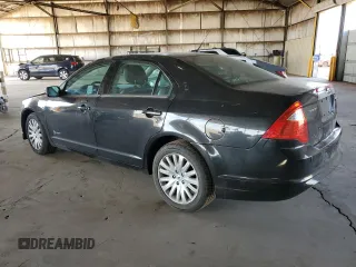 2012 Ford Fusion Hybrid с VIN 3FADP0L34CR416775, выставлен на аукционе Copart как лот 55108645 с пробегом 102 574 миль миль и Списание • Salvage title. История ставок и продаж доступна на DreamBid. Изображение 2.