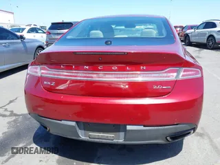 2016 Lincoln MKZ z VIN 3LN6L2G93GR612748, wystawiony jako IAAI lot #42262334 z przebiegiem 72 190 mil mil oraz . Historia ofert i sprzedaży dostępna na DreamBid. Obrazek 16.