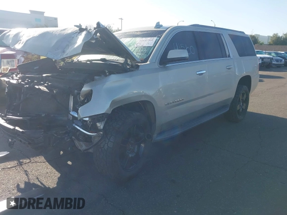 2015 Chevrolet Suburban LT z VIN 1GNSCJKC1FR608117, wystawiony jako IAAI lot #41641560 z przebiegiem 163 770 mil mil oraz . Historia ofert i sprzedaży dostępna na DreamBid. Obrazek 2.