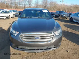 2015 Ford Taurus SEL with VIN 1FAHP2H86FG174102, listed as a IAAI auction lot 40997366 with 132,543 mi miles. Bid and sale history available at carsss.com. Image 12.