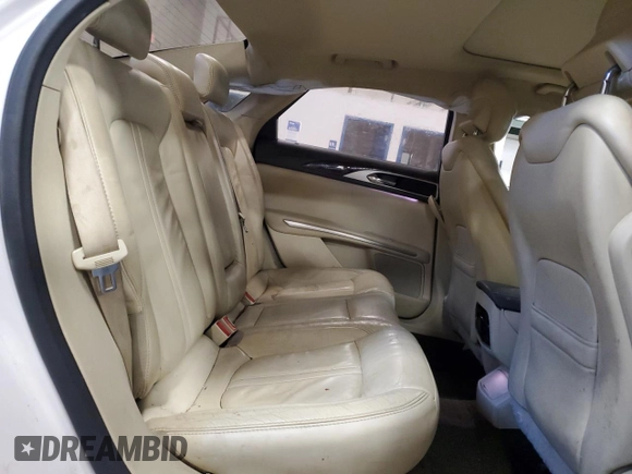 2015 Lincoln MKZ z VIN 3LN6L2G96FR606196, wystawiony jako Copart lot #48531905 z przebiegiem 213 172 mil mil oraz Szkoda całkowita • Salvage title. Historia ofert i sprzedaży dostępna na DreamBid. Obrazek 10.