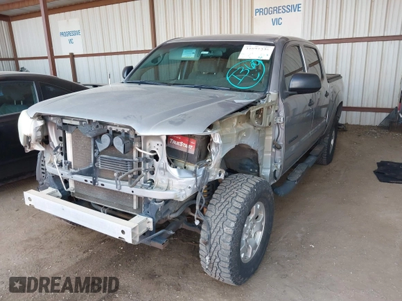2014 Toyota Tacoma with VIN 3TMLU4EN3EM162738, listed as a IAAI auction lot 41871226 with 135,318 mi miles and . Bid and sale history available at DreamBid. Image 18.