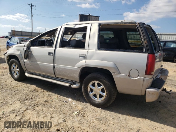 2000 GMC Denali z VIN 1GKEK13R2YR138523, wystawiony jako Copart lot #77609804 z przebiegiem 203 514 mil mil oraz Szkody całkowita. Historia ofert i sprzedaży dostępna na DreamBid. Obrazek 2.