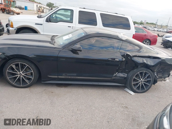 2016 Ford Mustang EcoBoost z VIN 1FA6P8THXG5267039, wystawiony jako IAAI lot #42014319 z przebiegiem 103 936 mil mil oraz . Historia ofert i sprzedaży dostępna na DreamBid. Obrazek 15.
