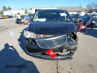 2011 Chrysler Town & Country Touring L z VIN 2A4RR8DG6BR803563, wystawiony jako IAAI lot #40921680 z przebiegiem 59 881 mil mil oraz . Historia ofert i sprzedaży dostępna na DreamBid. Obrazek 12.