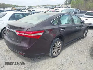 2014 Toyota Avalon Limited with VIN 4T1BK1EB1EU116371, listed as a IAAI auction lot 41936991 with Not Provided miles and . Bid and sale history available at DreamBid. Image 4.