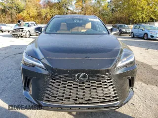 2023 Lexus RX with VIN 2T2BAMCA2PC013409, listed as a Copart auction lot 71721004 with 10,615 mi miles and Salvage Title. Bid and sale history available at carsss.com. Image 5.