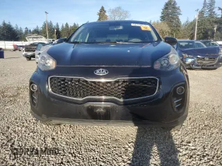 2017 Kia Sportage LX z VIN KNDPMCAC8H7235813, wystawiony jako Copart lot #52716515 z przebiegiem 135 221 mil mil oraz Szkoda całkowita • Salvage title. Historia ofert i sprzedaży dostępna na DreamBid. Obrazek 5.