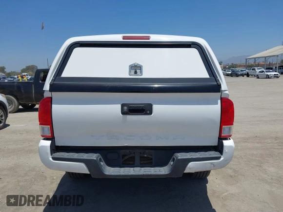 2017 Toyota Tacoma SR with VIN 5TFRX5GN4HX093545, listed as a IAAI auction lot 42505789 with 128,832 mi miles and . Bid and sale history available at DreamBid. Image 16.
