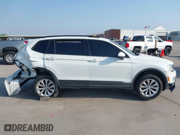 2018 Volkswagen Tiguan S with VIN 3VV1B7AX1JM119971, listed as a IAAI auction lot 42039977 with 108,932 mi miles and . Bid and sale history available at DreamBid. Image 13.