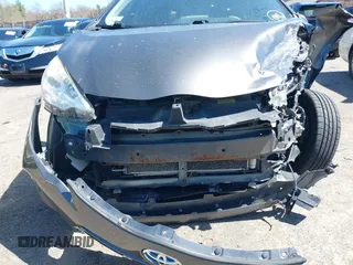 2014 Toyota Prius One with VIN JTDKDTB31E1568233, listed as a IAAI auction lot 42132907 with 96,093 mi miles and . Bid and sale history available at DreamBid. Image 17.