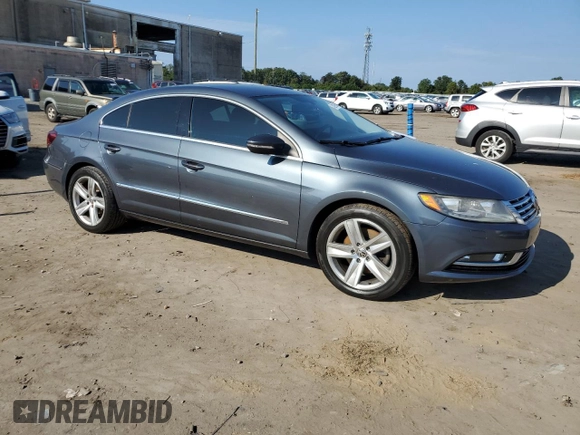 2013 Volkswagen CC R-Line with VIN WVWBP7AN0DE508775, listed as a Copart auction lot 74292864 with 76,086 mi miles and Salvage Title. Bid and sale history available at carsss.com. Image 4.
