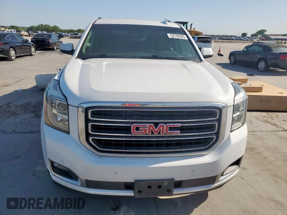 2019 GMC Yukon XL SLT with VIN 1GKS2GKC5KR363643, listed as a Copart auction lot 52749525 with 92,872 mi miles and Salvage title. Bid and sale history available at DreamBid. Image 5.