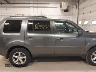 2011 Honda Pilot EX-L with VIN 5FNYF4H55BB039079, listed as a IAAI auction lot 42029278 with 173,216 mi miles. Bid and sale history available at carsss.com. Image 13.