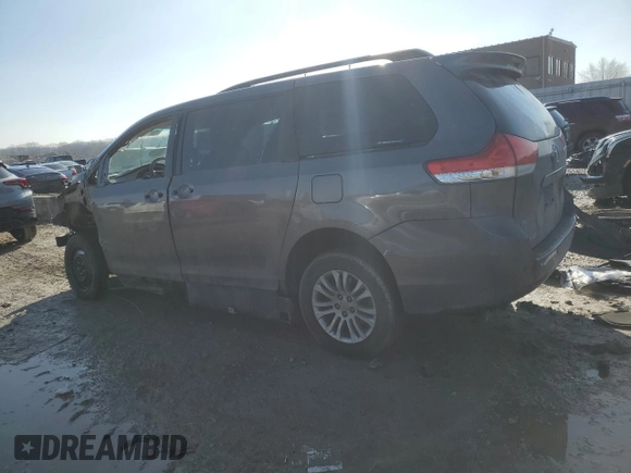 2014 Toyota Sienna XLE with VIN 5TDYK3DC5ES431148, listed as a Copart auction lot 43571065 with 82,854 mi miles and Salvage Title. Bid and sale history available at carsss.com. Image 2.