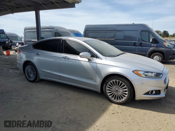 2013 Ford Fusion Titanium Hybrid with VIN 3FA6P0RU9DR303852, listed as a Copart auction lot 50652425 with 98,504 mi miles and Salvage Title. Bid and sale history available at DreamBid. Image 4.
