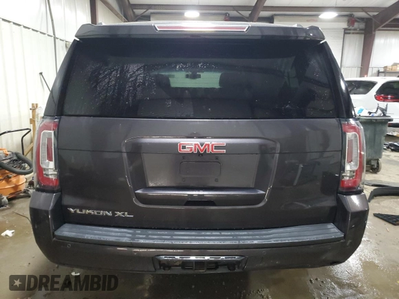 2016 GMC Yukon XL SLE with VIN 1GKS2FKC5GR335830, listed as a Copart auction lot 71294384 with 85,092 mi miles and Salvage Title. Bid and sale history available at carsss.com. Image 6.