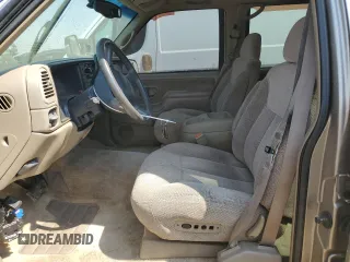 1999 Chevrolet Suburban with VIN 3GNEC16R2XG144591, listed as a Copart auction lot 65368364 with 244,605 mi miles and Non Repairable. Bid and sale history available at carsss.com. Image 7.