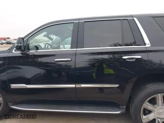 2018 Cadillac Escalade Luxury with VIN 1GYS4BKJ3JR143952, listed as a IAAI auction lot 41333902 with 124,265 mi miles. Bid and sale history available at carsss.com. Image 14.