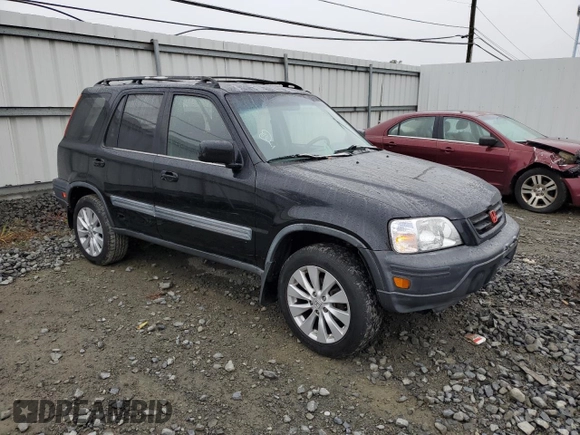 1999 Honda CR-V EX with VIN JHLRD1867XC012913, listed as a Copart auction lot 73193224 with 198,853 mi miles and Clean Title. Bid and sale history available at carsss.com. Image 4.
