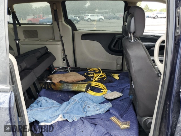 2017 Dodge Grand Caravan SE z VIN 2C4RDGBG2HR755893, wystawiony jako Copart lot #56722045 z przebiegiem Nie podano mil oraz Szkoda całkowita • Salvage title. Historia ofert i sprzedaży dostępna na DreamBid. Obrazek 11.